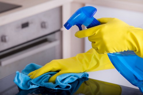 Safety-focused carpet cleaning team reviewing procedures